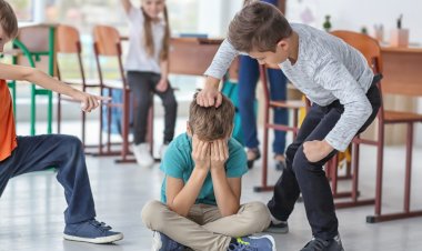 Why do schoolchildren often show aggression?