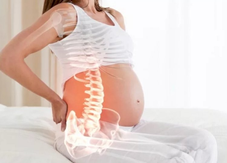 Болит спина при беременности, причины