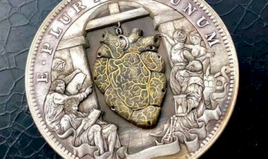 Монета с бьющимся сердцем