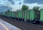 Тепловозы М62-1242 и ТЭМ2-2204 с порожняком из полувагонов