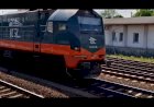 Тепловоз 311D-05 с полувагонами