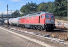 Тепловоз ТЭ109 (232 241 - 0) с цистернами для сжиженного газа